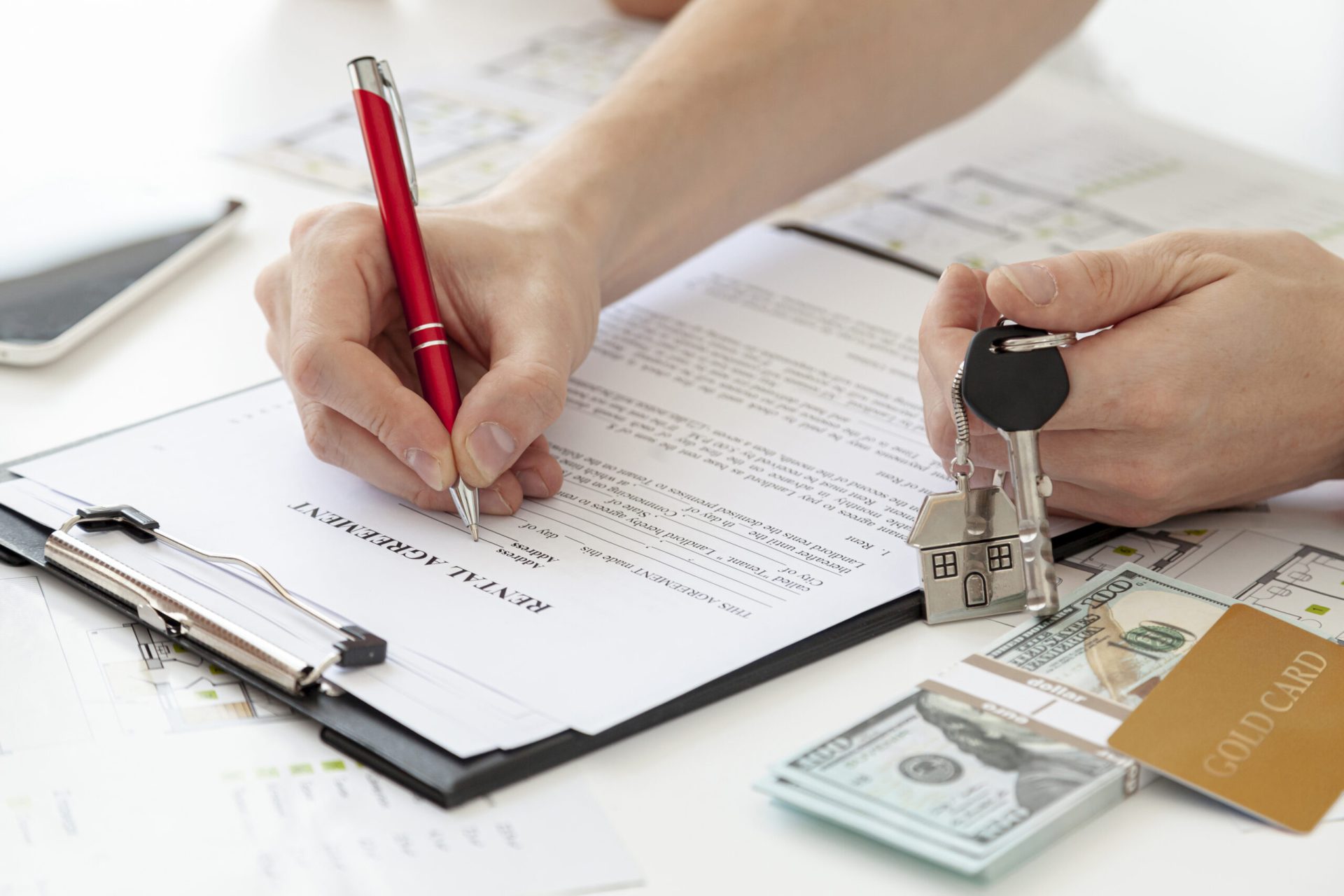 high-angle-man-signing-contract-new-home