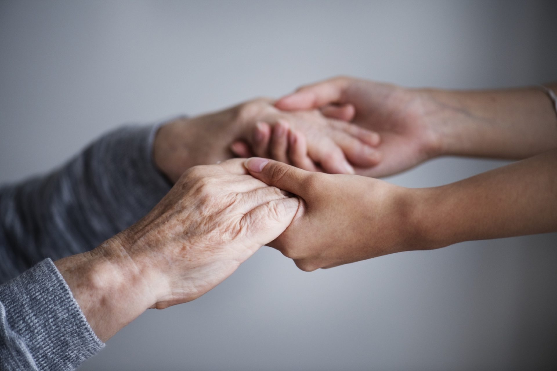 Close up of supporting hands